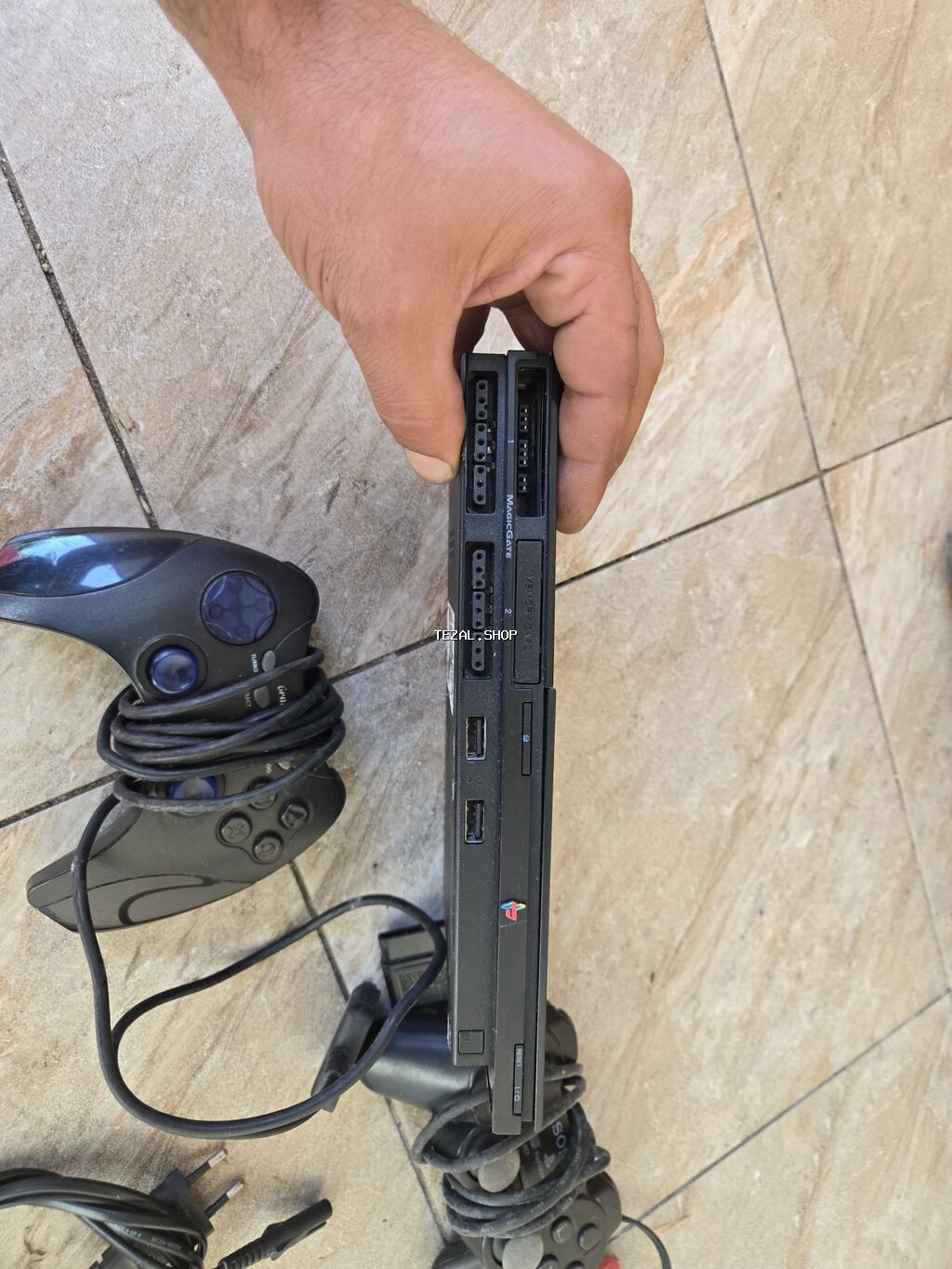 Ps 2. diski oxumur . qalan her weyu iwleyir.Sony PlayStation 2 Slim