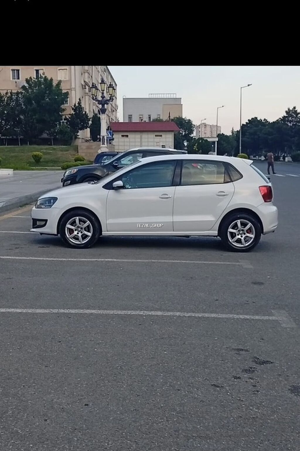 Volkswagen Polo, ağ rəng, 5 qapılı hetçbek. Mühərrik və ötürmə: - - şəkil 4