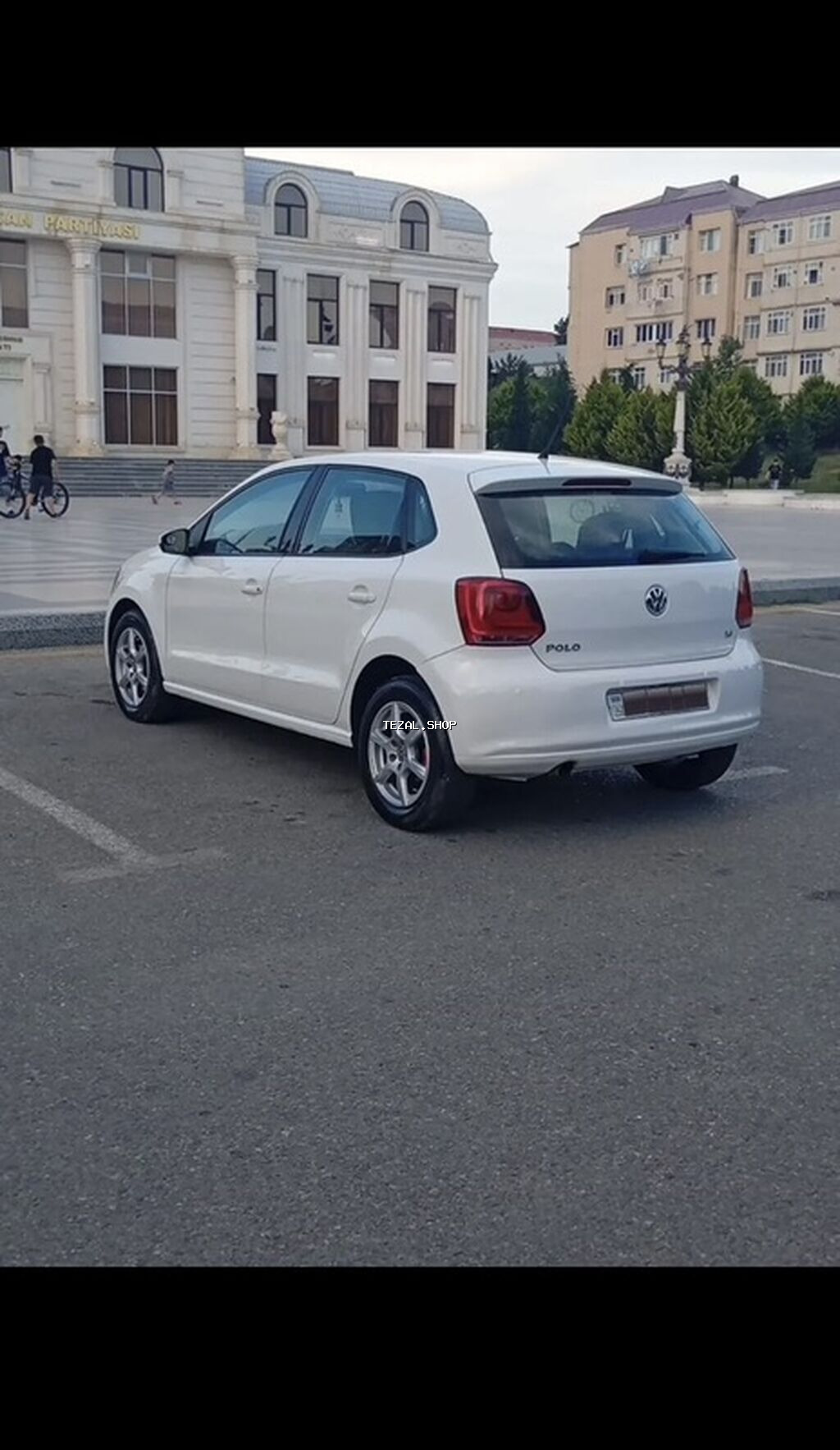 Volkswagen Polo, ağ rəng, 5 qapılı hetçbek. Mühərrik və ötürmə: - - şəkil 5