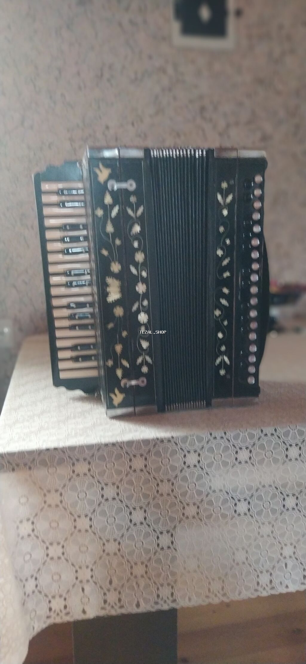 Qarmon, Akustik, İşlənmiş, Ünvandan götürmə